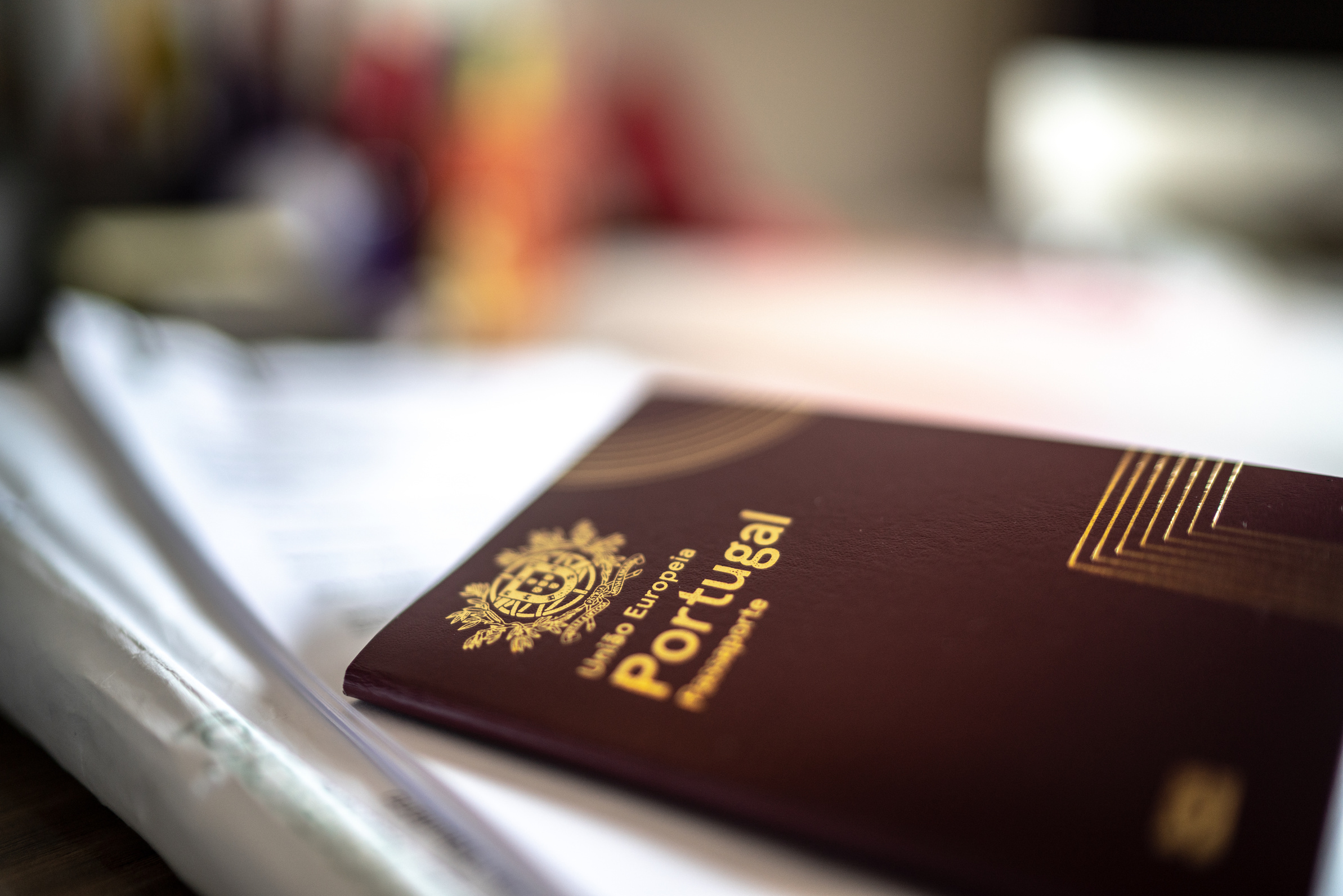 Portuguese passport at desk